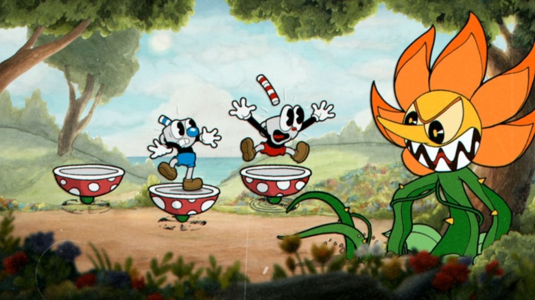 Cuphead y Mugman peleando contra una flor gigante
