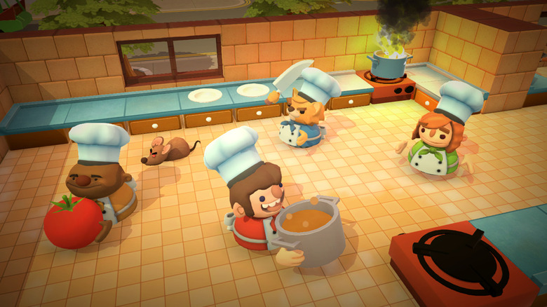Cuatro jugadores navegan juntos por una cocina en Overcooked