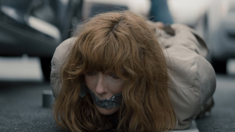 Cathy Noland de Kelly Reilly está atada y amordazada en una carretera en 10x10