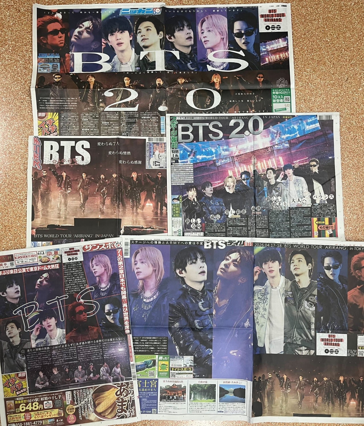 BTS ha aparecido en los titulares de primera plana de los principales periódicos deportivos de Japón. (Entretenimiento de gran éxito)